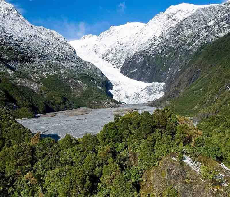 Franz Josef Glacier, West Coast - A majestic glacier offering guided hikes, helicopter tours, and stunning ice formations.