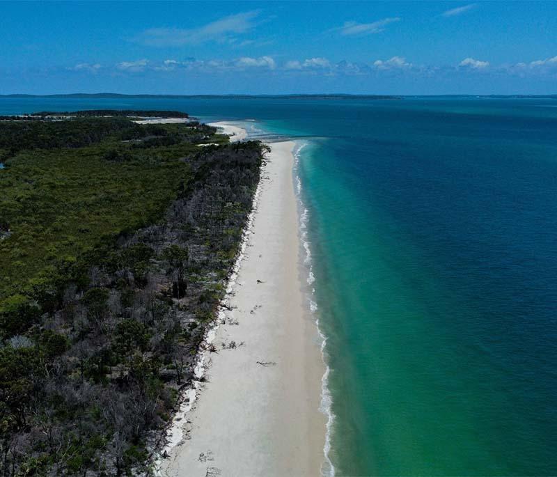  Fraser Island in Queensland is the world's largest sand island, with unique ecosystems and freshwater lakes.