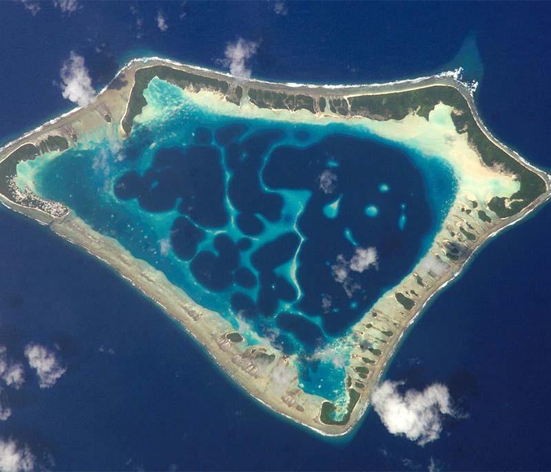 Gan, largest island in Addu Atoll, connected to others via causeways, offers natural 