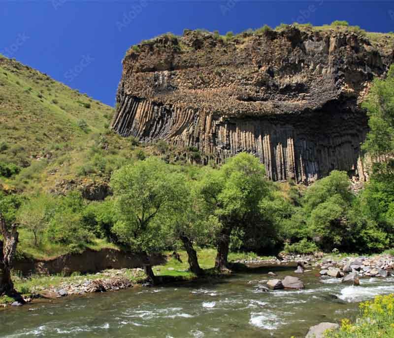 Garni Gorge, featuring striking geological formations and the historic Garni Temple at its edge with unique views.