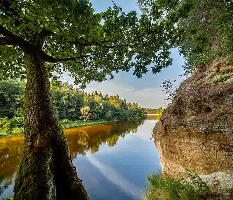 Gauja National Park, Latvia's largest national park, known for its beautiful landscapes, hiking trails, and historic castles.