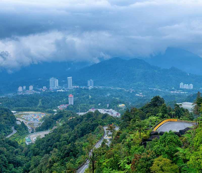 Genting Highlands in Pahang provides cool climates, theme parks, and casino entertainment atop scenic mountains.