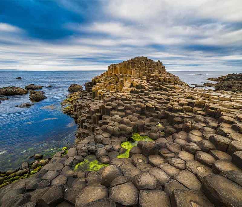 Giant's Causeway, County Antrim, a UNESCO site with hexagonal basalt columns formed by volcanic activity.