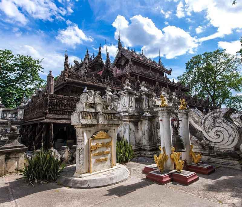 Golden Palace Monastery, Mandalay - A historic wooden monastery known for its exquisite carvings and peaceful atmosphere.