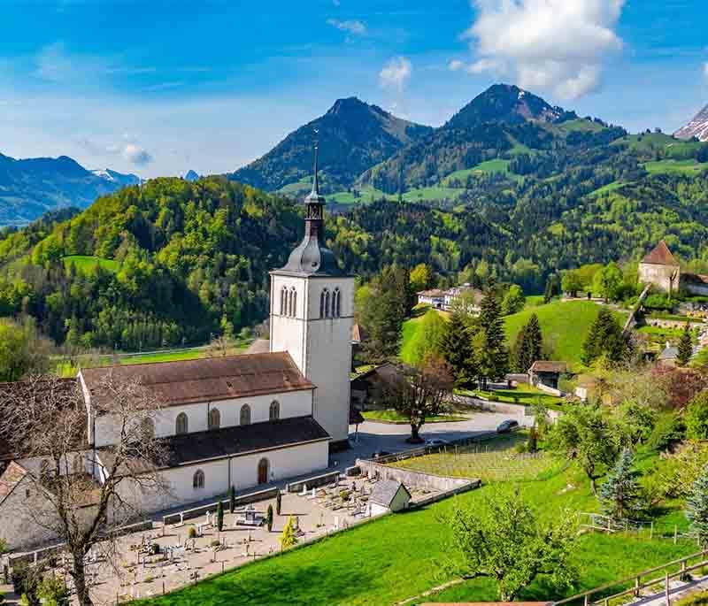 Gruyères - A medieval town famous for its cheese, featuring a castle, HR Giger Museum, and cultural richness.