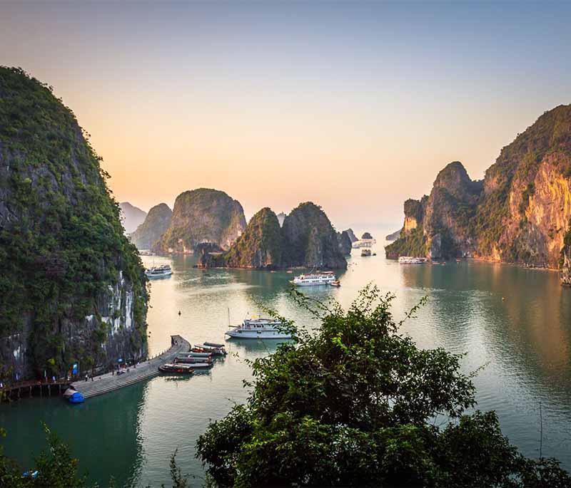 Ha Long Bay - A UNESCO World Heritage site famous for its emerald waters and thousands of limestone islands.