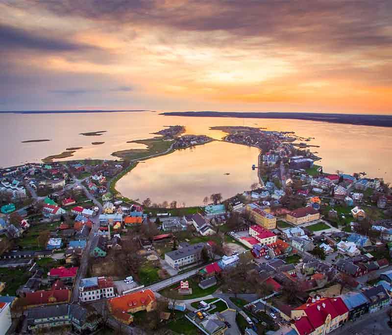 Haapsalu, a charming seaside town known for its historic railway station, medieval castle, and therapeutic mud baths.