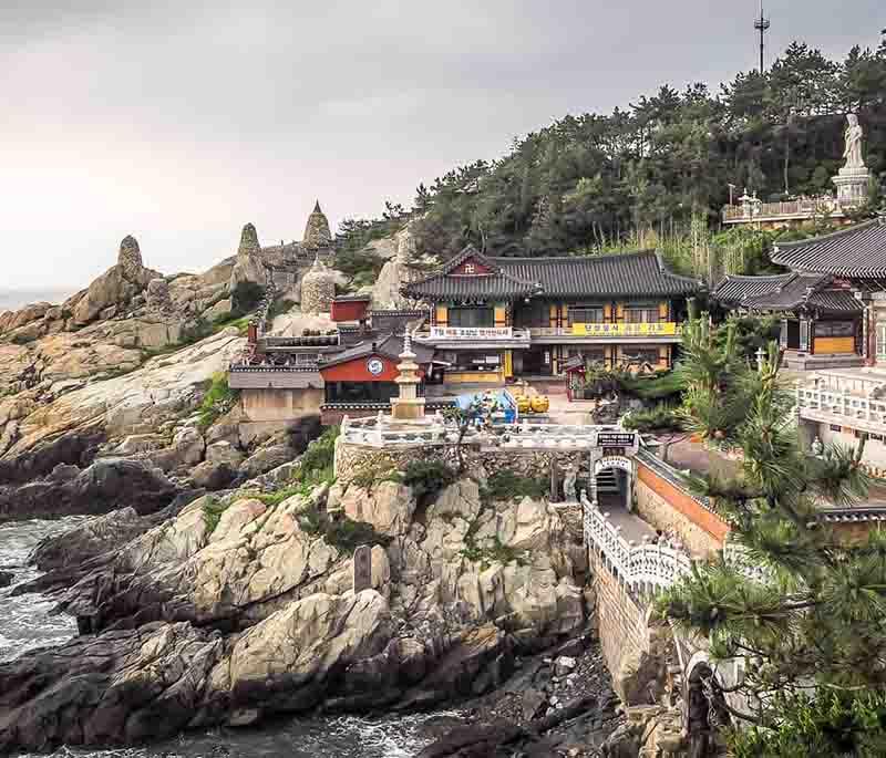 Haedong Yonggungsa Temple, Busan - A Buddhist temple on a cliff overlooking the sea, known for its setting.