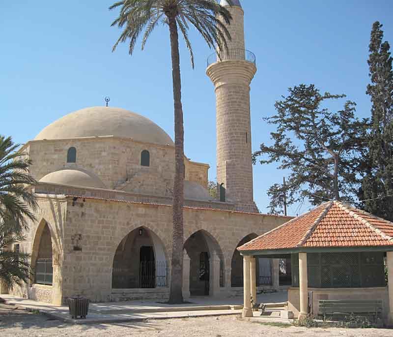 Hala Sultan Tekke, a significant Muslim pilgrimage site, located on the shores of Larnaca Salt Lake, with a beautiful mosque.