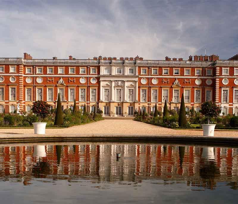 Hampton Court Palace, London - A historic royal palace known for its stunning gardens, maze, and Tudor architecture.