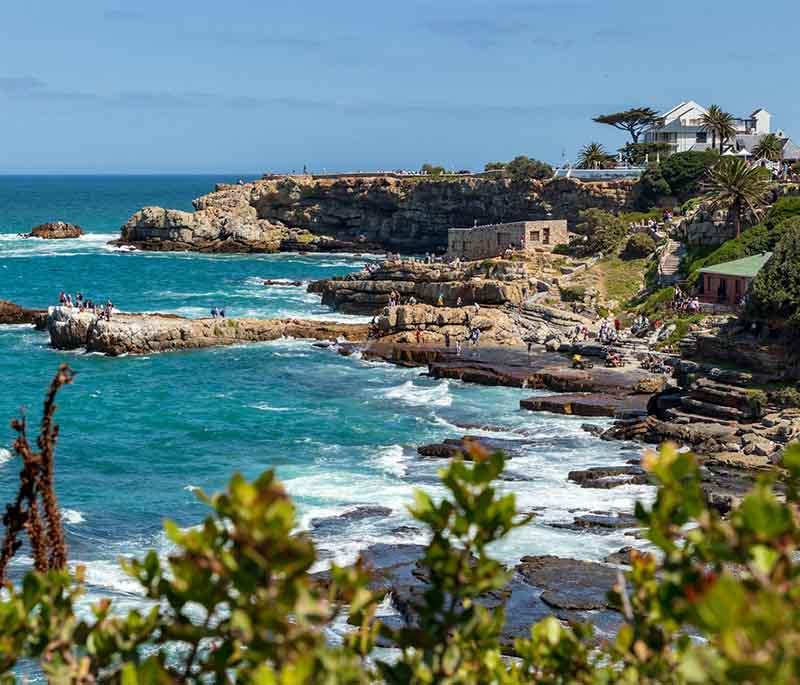 Hermanus - A coastal town famous for whale watching, beautiful beaches, charming atmosphere, and outdoor activities.