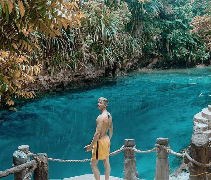 Hinatuan Enchanted River - A deep, blue river in Surigao del Sur, known for its enchanting beauty and crystal-clear waters.