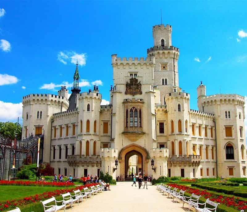 Hluboka Castle, a stunning neo-Gothic castle inspired by Windsor Castle, known for elegant interiors and art collections.