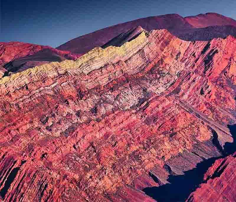 Hornocal, Jujuy: Showing the vibrant, striped mountain peaks in a remote area, a colorful spectacle.