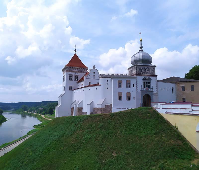 Hrodna Castle, featuring a historic castle complex with medieval and Renaissance elements, rich in history.