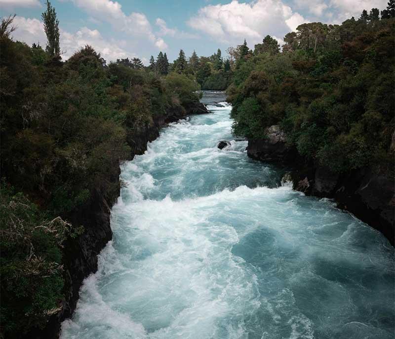 Huka Falls, Taupo - A powerful waterfall on the Waikato River, known for its thunderous flow and striking blue waters.