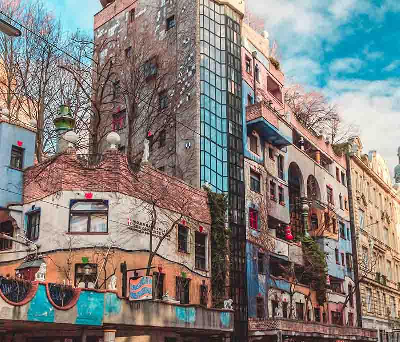 Hundertwasserhaus in Vienna: Iconic expressionist building with unique, colorful styles and architecture.