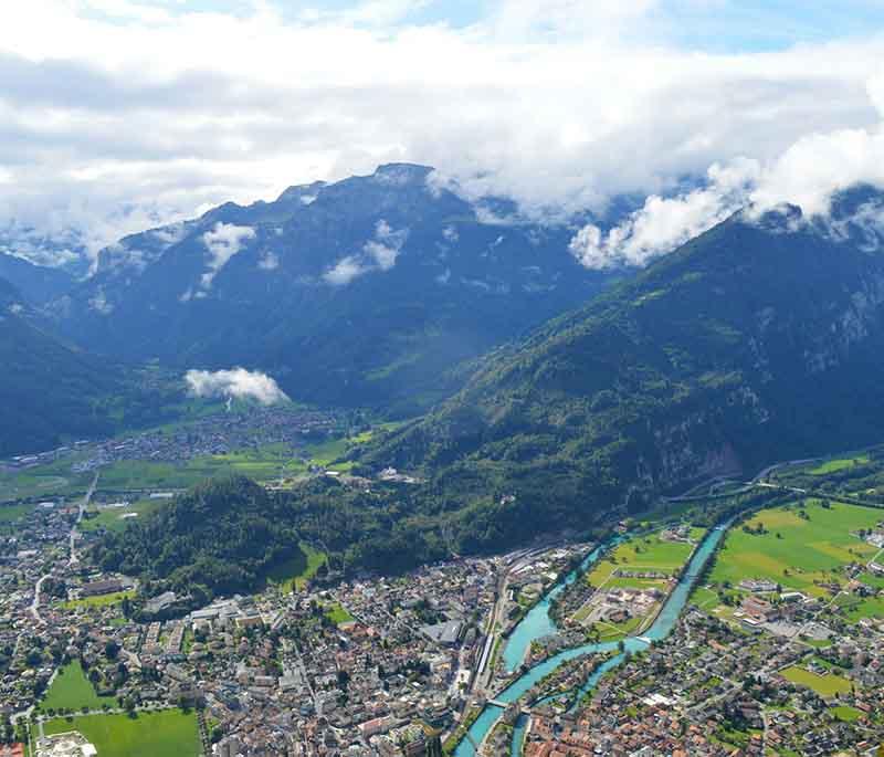 Interlaken - A resort town situated between Lake Thun and Lake Brienz, known for adventure sports and scenic beauty.