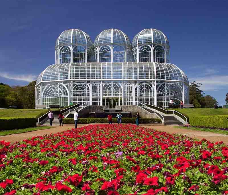 Jardim Botânico, Curitiba, a landscaped botanical garden with a greenhouse, walking paths, and diverse plant species.