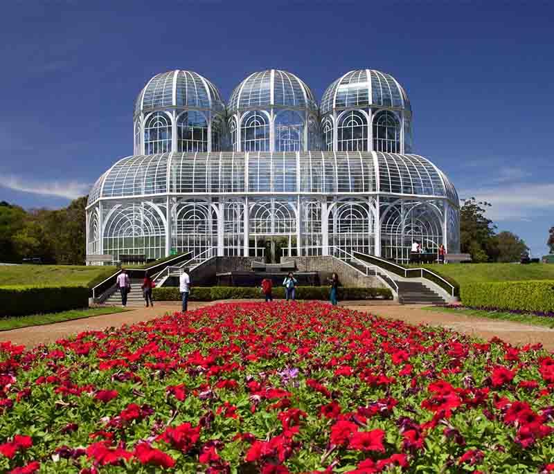 Jardim Botânico, Curitiba, a landscaped botanical garden with a greenhouse, walking paths, and diverse plant species.