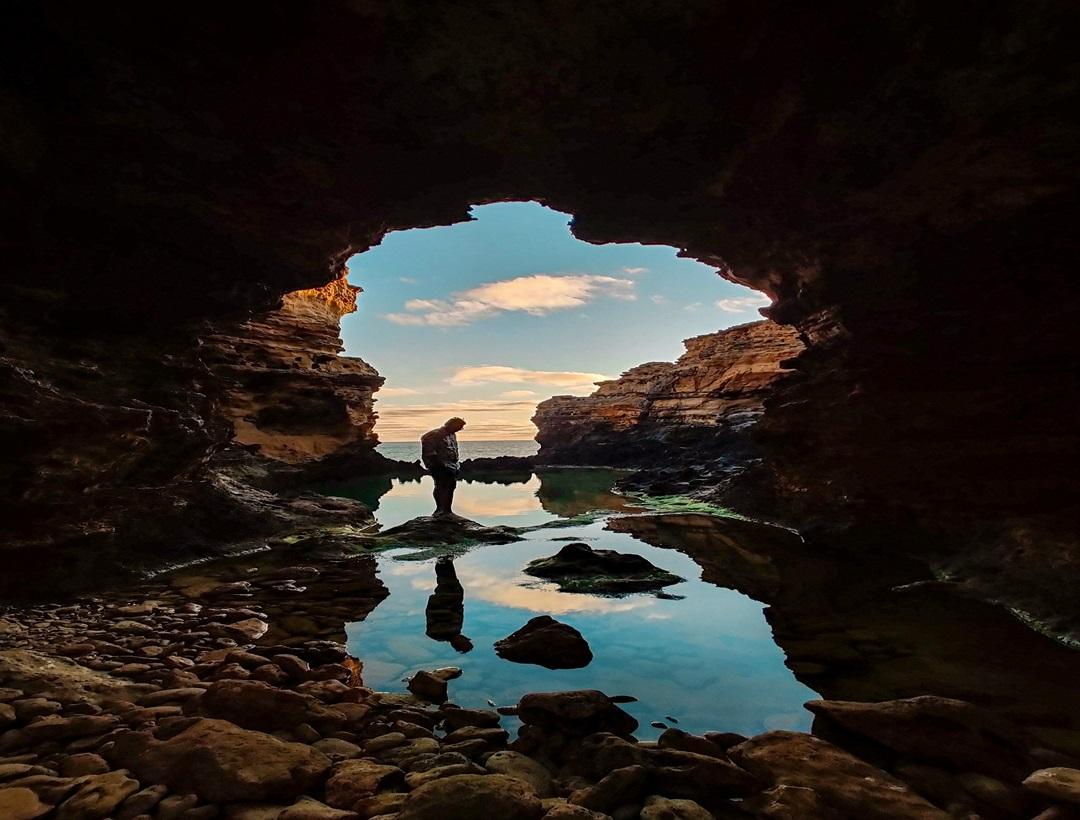 Jeita Grotto, a stunning limestone cave system with impressive stalactites and stalagmites, accessible by boat and foot.