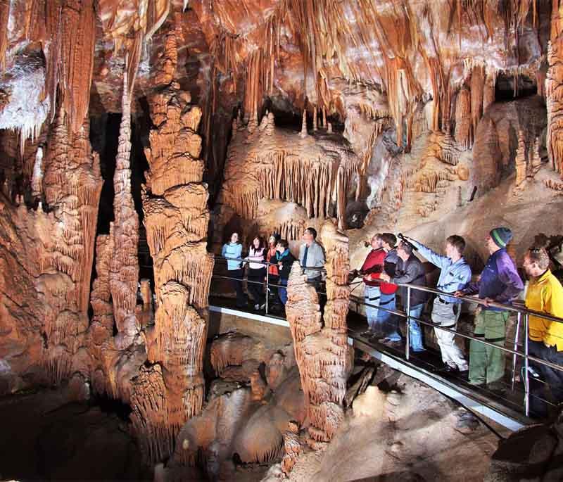  Jenolan Caves in New South Wales showcases stunning underground rivers, limestone formations, and spectacular tours.