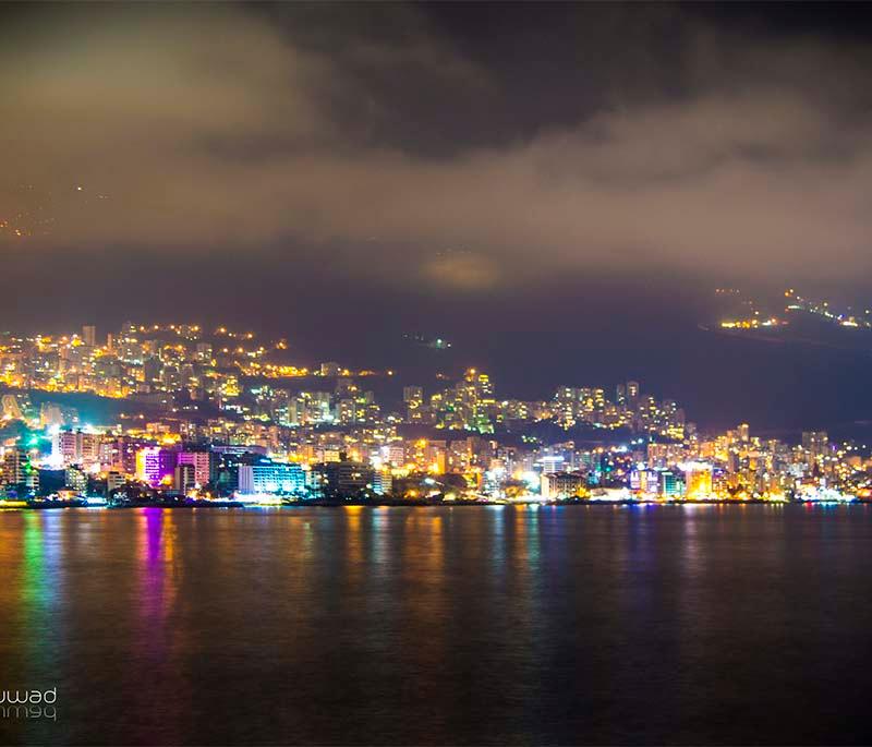 Jounieh, a coastal city known for its beautiful bay, vibrant nightlife, and the nearby Harissa hilltop.