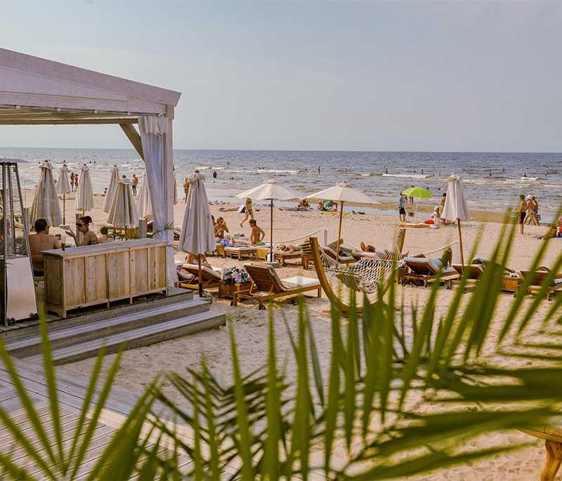 Jurmala Beach, a popular seaside destination known for its long sandy beach, charming wooden cottages, and wellness resorts.