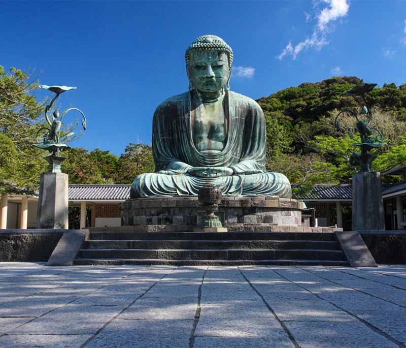 Kamakura, a coastal town known for its historic temples, the Great Buddha (Daibutsu), and beautiful hiking trails.