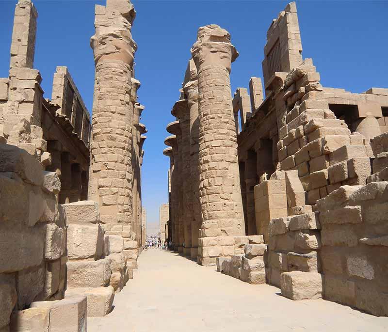 Karnak Temple, an impressive temple complex dedicated to the god Amun, known for its massive columns and sacred lake.