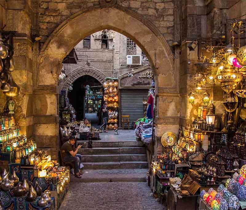 Khan el-Khalili Bazaar, a bustling market in Cairo's historic district, offering crafts, spices, jewelry, and souvenirs.