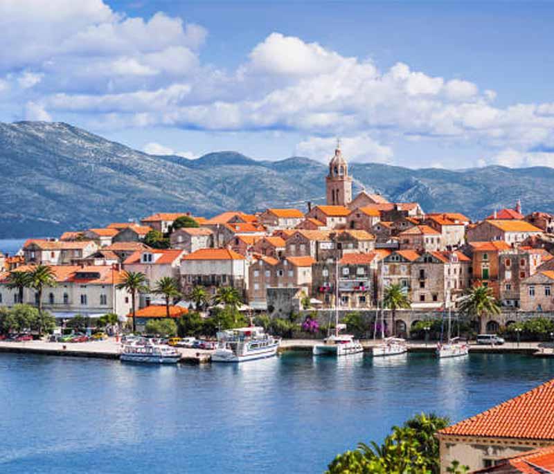 Korčula Island, featuring medieval architecture, beautiful beaches, and a rich heritage, often linked to Marco Polo.