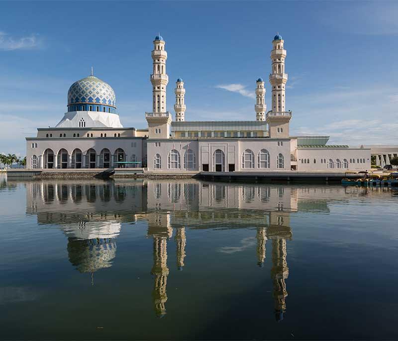 Kota Kinabalu City Mosque in Sabah is known for its majestic structure and scenic location by the sea.