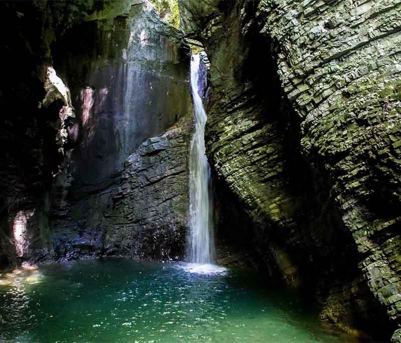 Kozjak Waterfall - A beautiful waterfall located near the town of Kobarid, accessible by a scenic hiking trail.
