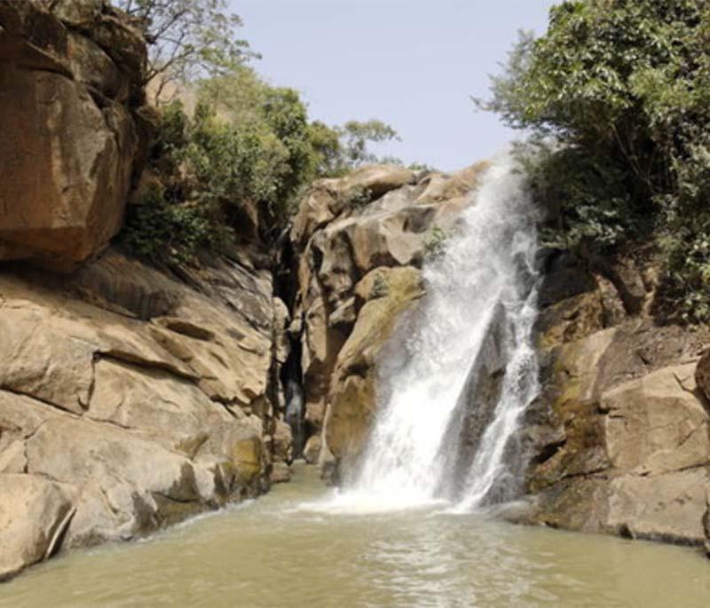 Kurra Falls - A scenic waterfall in Plateau State, ideal for hiking, nature photography, and relaxation.