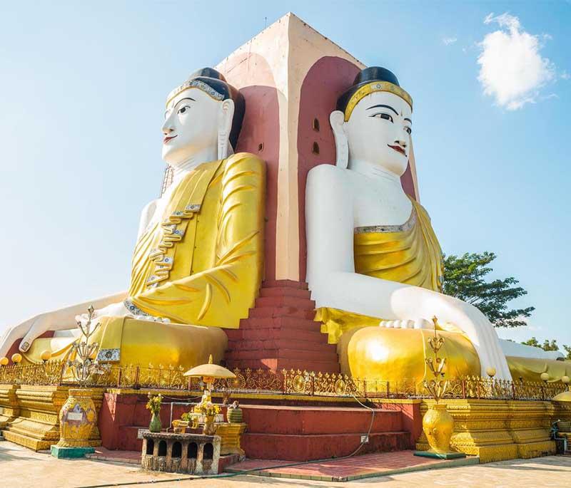 Kyaik Pun Pagoda, Bago - Features four giant Buddha statues sitting back-to-back, and peaceful surroundings.