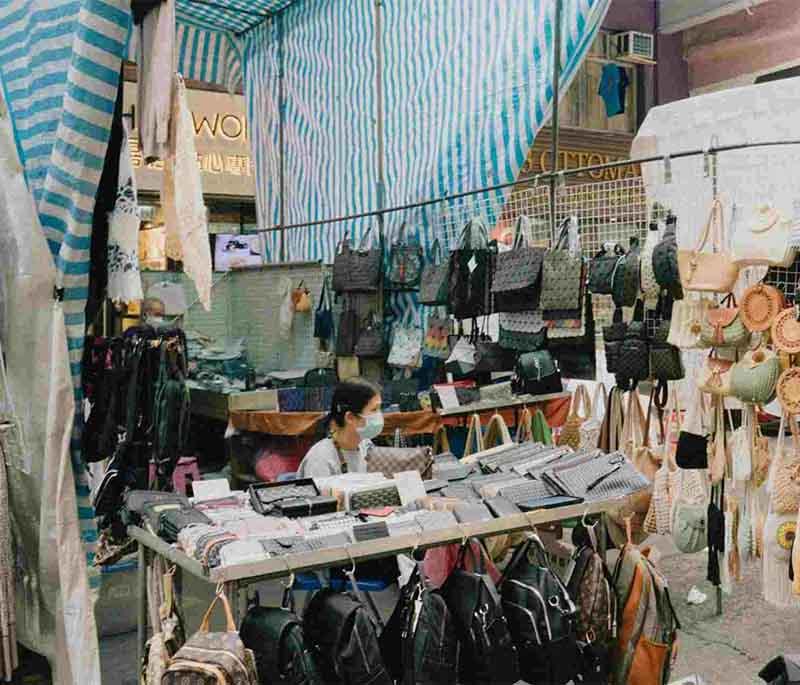 Ladies' Market in Hong Kong, a bustling street market offering fashion, accessories, and souvenirs at bargain prices.