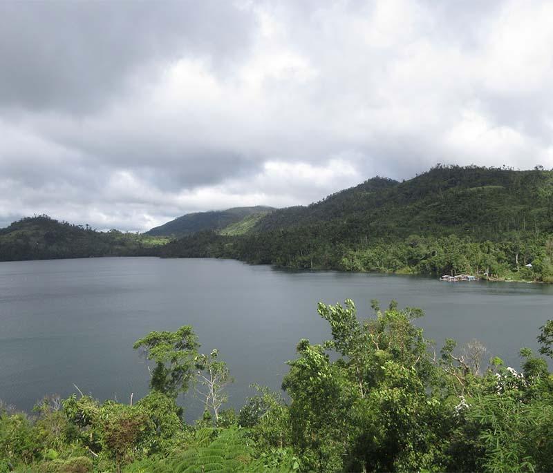 Lake Danao in Leyte - A violin-shaped lake known for its natural beauty, boating activities, and serene atmosphere.