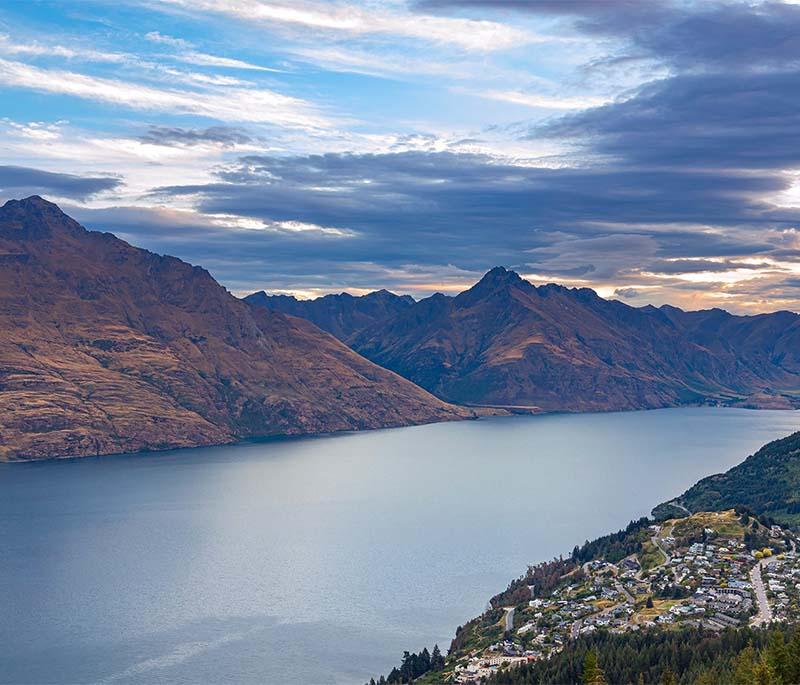 Lake Wakatipu, Otago - A scenic lake surrounded by mountains, offering boating and hiking opportunities.