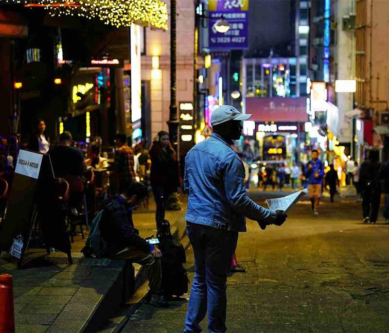 Lan Kwai Fong in Hong Kong, a bustling nightlife hub known for its bars, restaurants, and vibrant social scene.