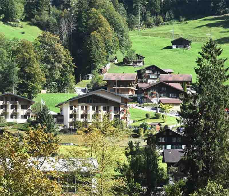 Lauterbrunnen Valley - Serene valley with dramatic cliffs and cascading waterfalls, ideal for nature lovers and hikers.