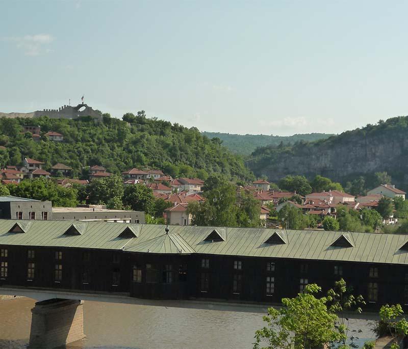Lovech, featuring the historic covered bridge, the medieval Lovech Fortress, and scenic surroundings.