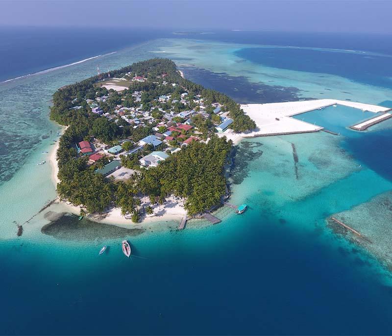 Magoodhoo: Agricultural community nestled among vibrant coral reefs, offering a unique blend of rural and marine experiences.