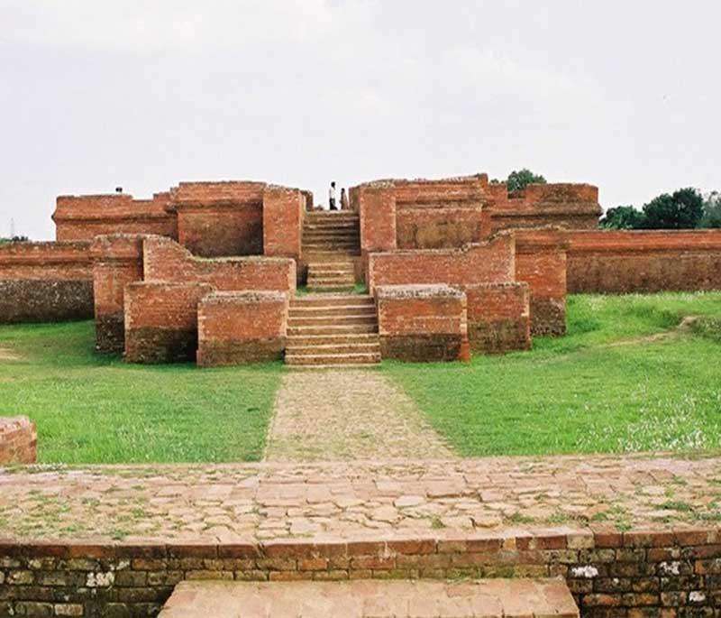 Mainamati Ruins, Comilla, depicting the archaeological site with ancient Buddhist ruins and artifacts.