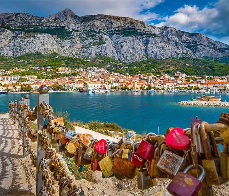 Makarska, a coastal town with beautiful beaches, a lively promenade, and stunning views of the Biokovo Mountain.