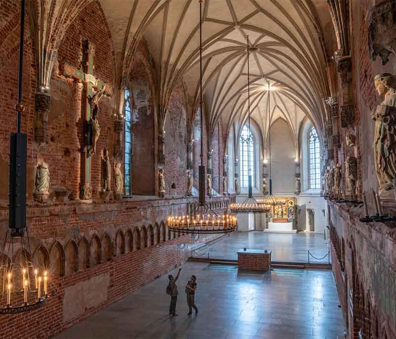 Malbork Castle - Imposing medieval fortress and UNESCO site showcasing Gothic architecture and historical significance.