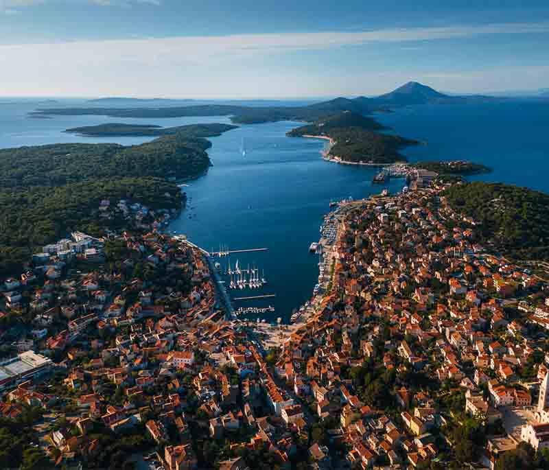 Mali Losinj, a picturesque town on Losinj Island, known for its stunning harbor, health tourism, and charming ambiance.