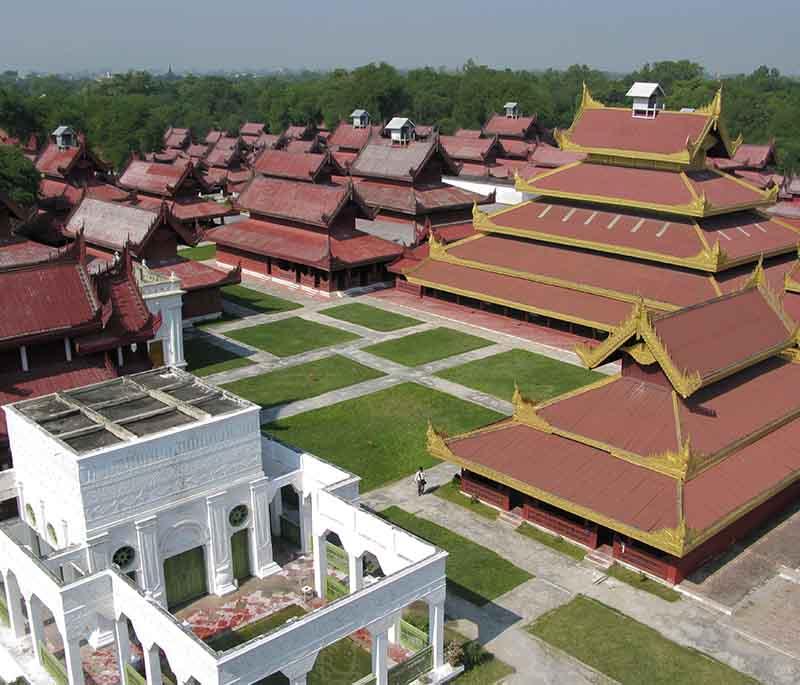 Mandalay Palace - The last royal palace of the Burmese monarchy, surrounded by a large moat and lush gardens.