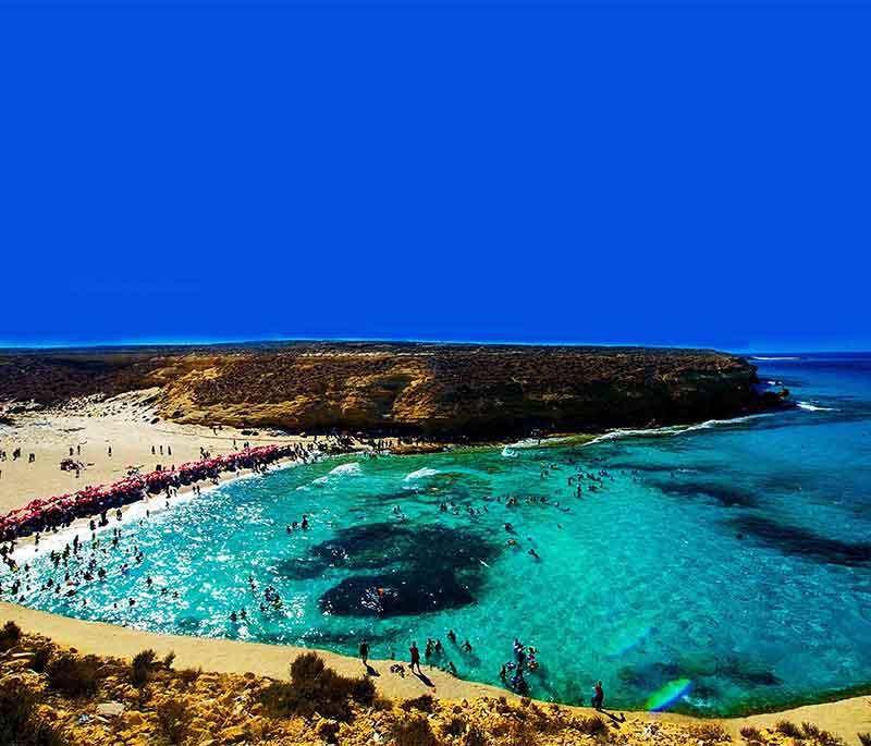 Marsa Matrouh, a coastal city on the Mediterranean Sea, known for its pristine beaches and crystal-clear waters.