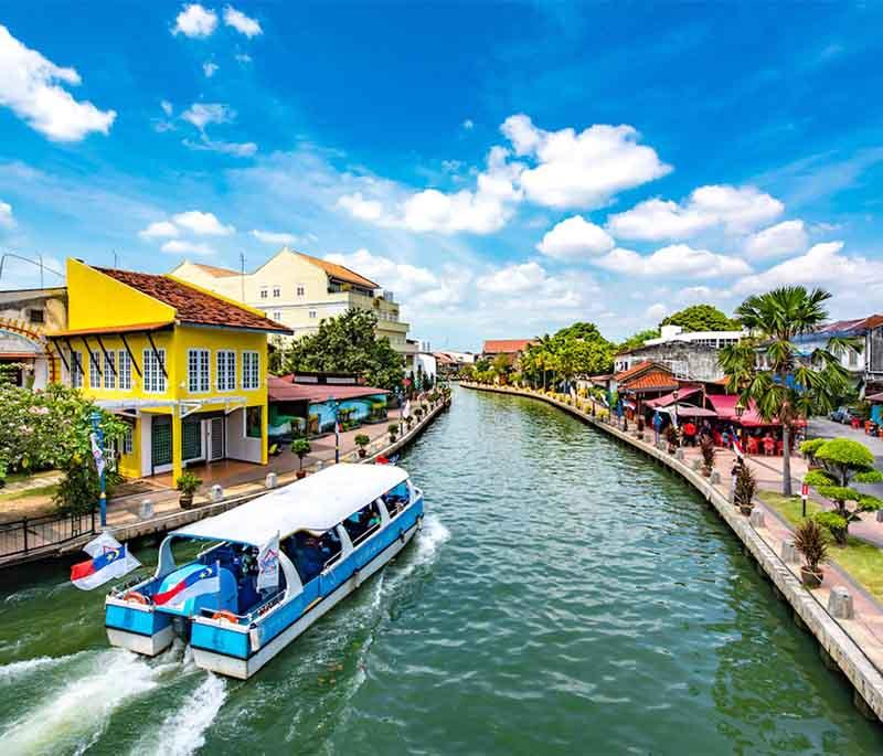 Melaka River Cruise in Melaka gives a scenic view of the historic city from its riverside, especially at night.